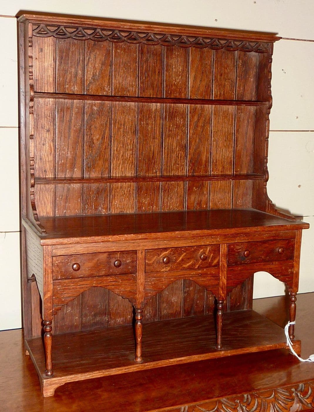 Oak Welsh dresser with tall open plate rack and a drawer and cupboard base
