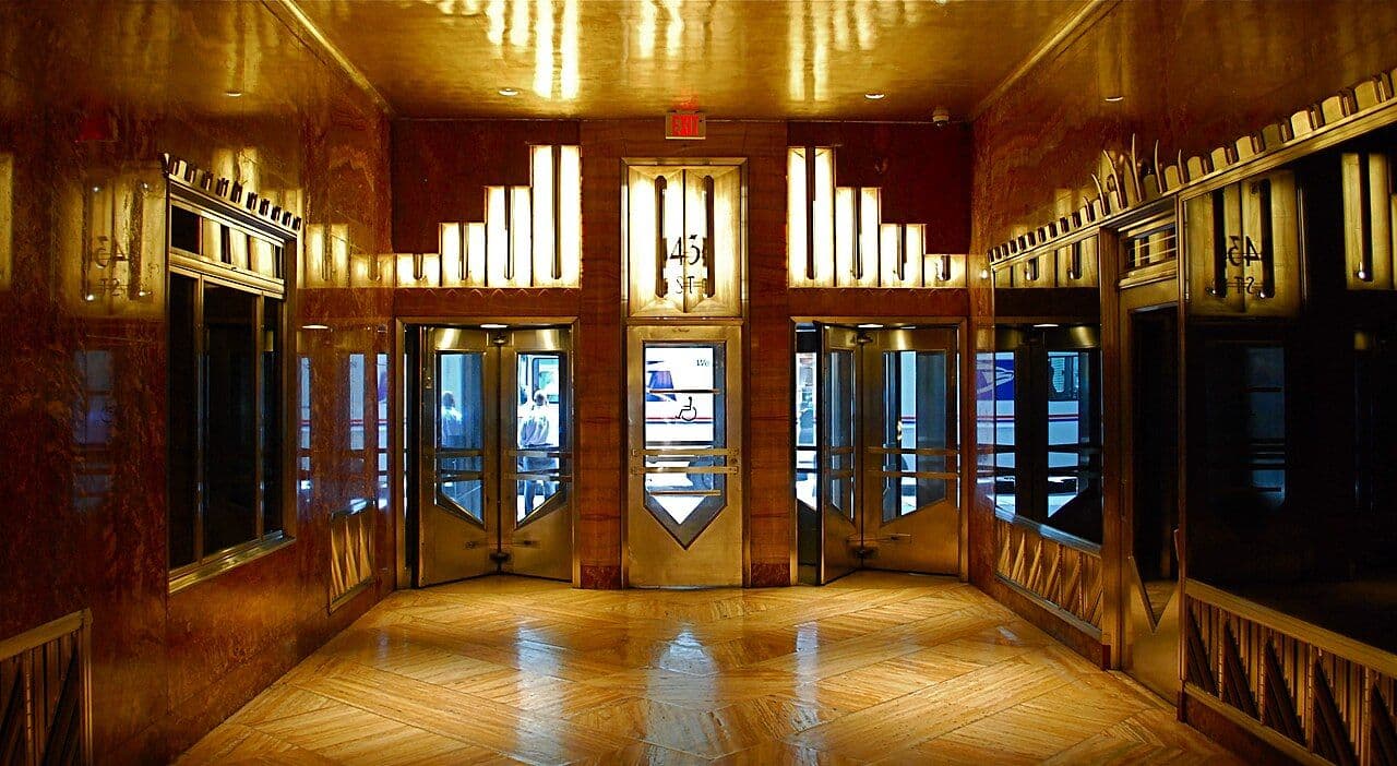 Chrysler Building lobby with red marble walls, chrome details and elevator doors