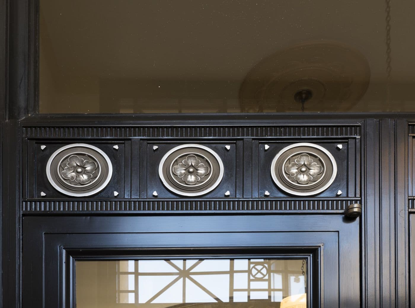 Stepped Art Deco moulding above an interior doorway