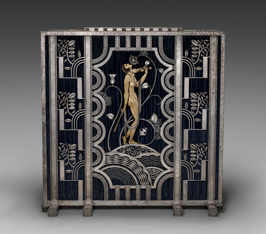 Art Deco wrought-iron screen with a stylized female violinist among geometric scrolls